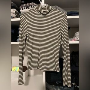 Green and white striped turtleneck